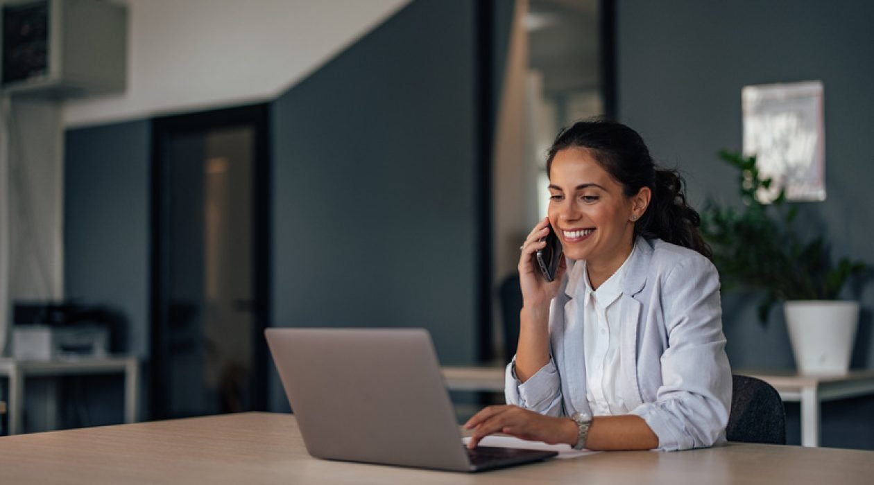 Adult woman, calling her boss about the advice for the project.